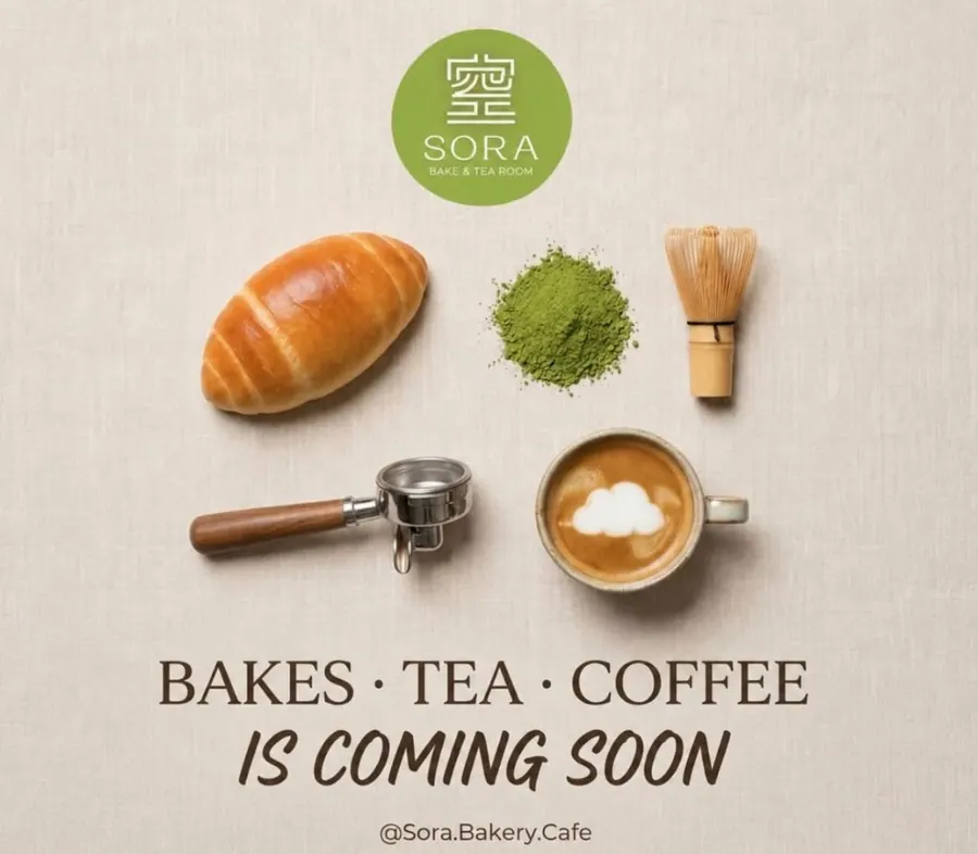Salt bread, matcha powder with bamboo whisk, espresso portafilter, and latte art at Sora